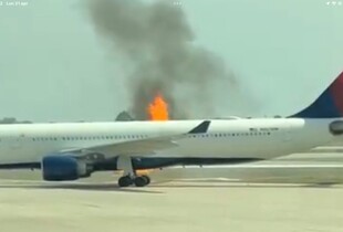 У США в аеропорту перед зльотом загорівся літак з пасажирами (відео)